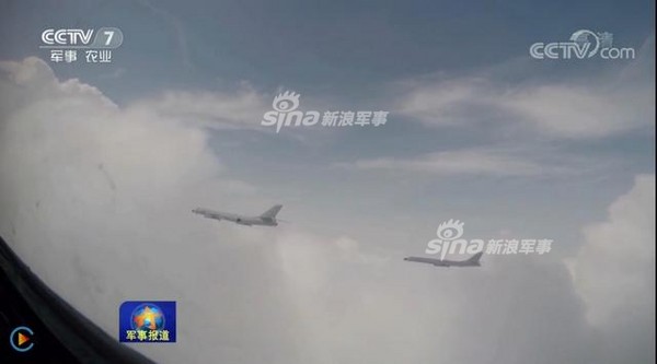 ▲▼轟-6K戰神部隊赴西太洋平遠海的訓練，印尼空軍蘇-30戰鬥機伴飛。（圖／翻攝自新浪軍事）