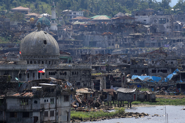 ▲▼菲律賓宣布收復馬拉威市(Marawi)，在最後據點中發現42具親IS武裝份子的屍體。（圖／路透社）