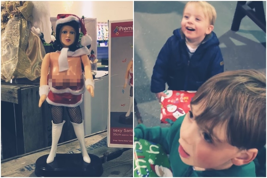 ▲兩個小男孩看到「豪乳聖誕女郎」扭動娃娃，目不轉睛，最後爆出乳房逗得兄弟倆呵呵呵笑得不停。（圖／翻攝自YouTube）