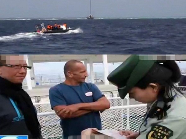 巴西籍帆船誤在南沙三角礁淺灘擱淺，船員被中國武警船救起後，受到武警邊防工作人員詢問調查。（圖／翻攝自多維新聞網）