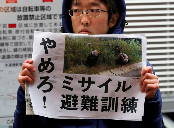 ▲▼東京防空演習，民眾表示，「徒增恐懼」。（圖／路透社）