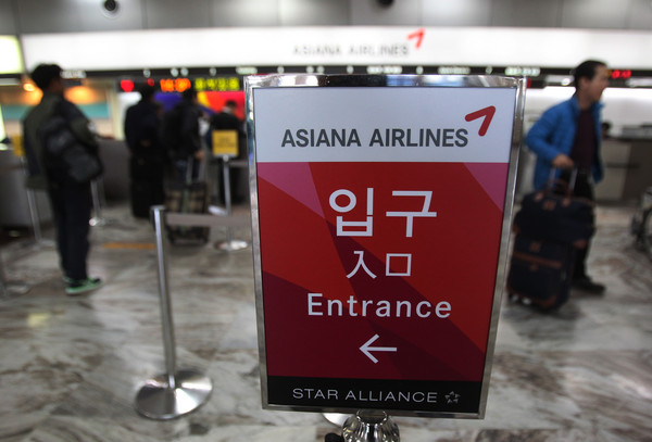 ▲▼韓亞航空（Asiana Airlines）位於首爾金浦國際機場的售票櫃檯。（圖／達志影像／美聯社）