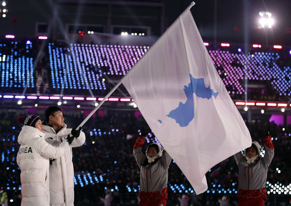 ▲2018平昌冬奧,南北韓舉統一旗。（圖／達志影像／美聯社）