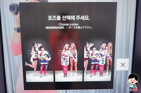 ▲和BIGBANG合照的韓國觀光公社旅遊諮詢中心。（圖／PEKO提供）