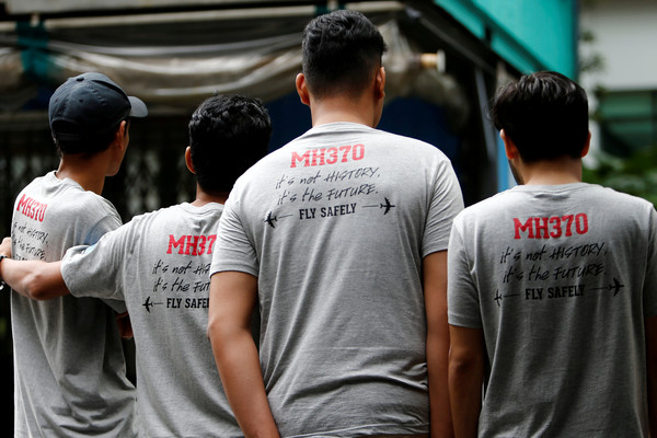 ▲▼ 馬來西亞民眾出席馬航MH370四周年追思紀念活動。（圖／路透社）