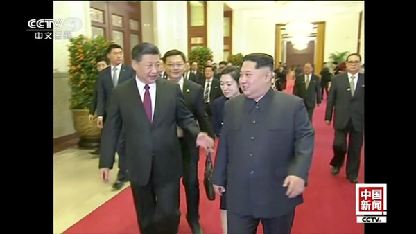 ▲▼北韓最高領導人金正恩露出親切笑容，和大陸國家主席習近平進行會晤。（圖／路透社）