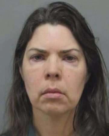 ▲▼馬里蘭州女子Kristina Petrie想用鋸子鋸掉兒子的頭遭逮捕。（圖／Montgomery County警方）