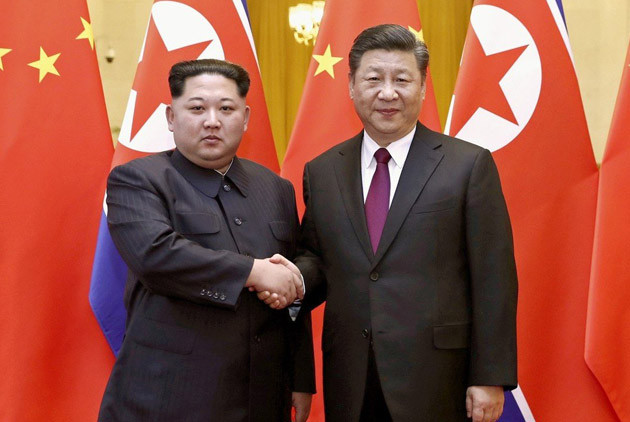 ▲北韓領導人金正恩（左）上月突訪北京，與大陸國家主席習近平（右）會見 。（圖／中國外交部）