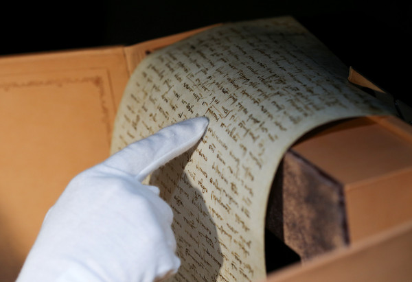 ▲▼馬可波羅700年前遺囑的羊皮紙複製品。（圖／路透社）
