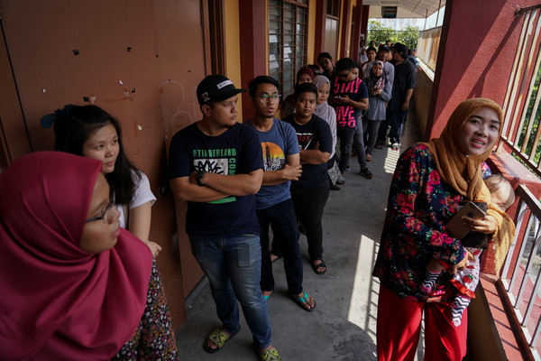 ▲▼排隊投票的馬來西亞選民。（圖／路透社）
