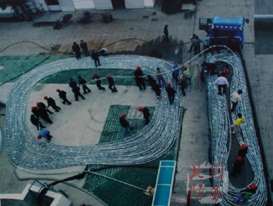 中國電科第23所展出的光纖水聽器岸基陣列實物圖片，證實解放軍已開始在東海南海構築反潛大網。（圖／翻攝自北國防務）