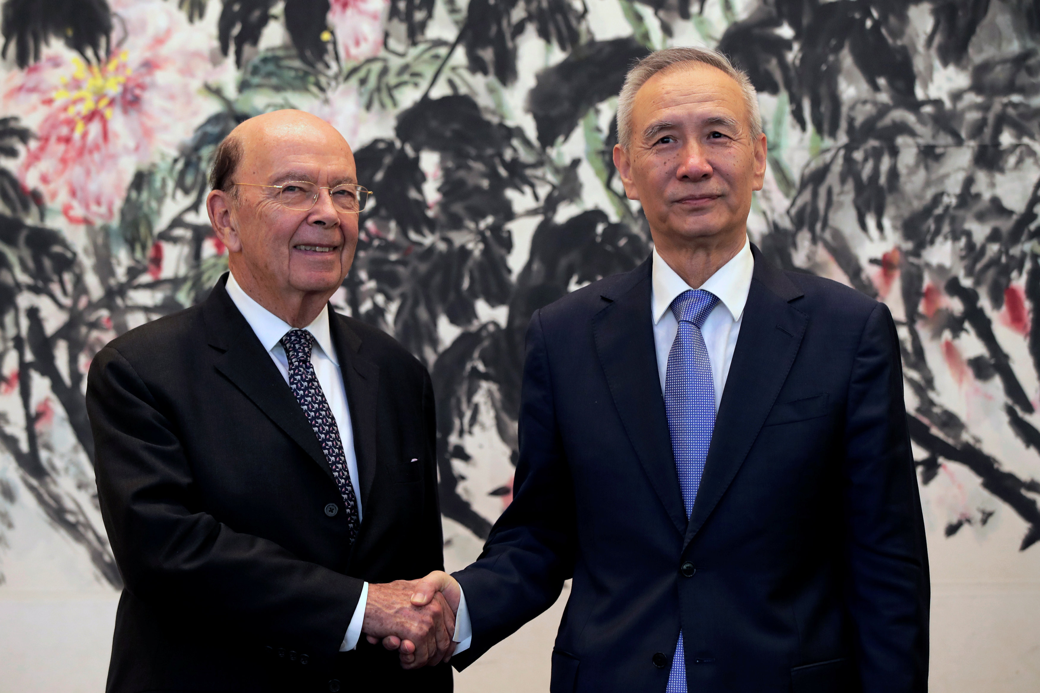 美國商務部長羅斯（Wilbur Ross）與中國國務院副總理劉鶴針對兩國貿易問題協商。（圖／路透社）
