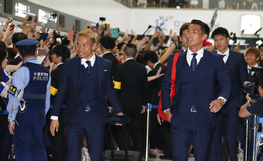 ▲▼日本球迷在機場，歡迎國家隊歸來。（圖／達志影像／美聯社）