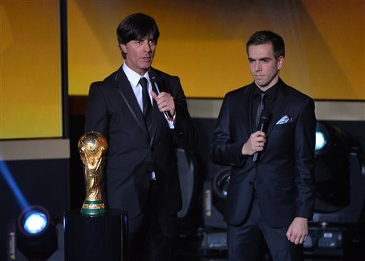▲2014年世界盃頒獎典禮，德國教練勒夫和隊長拉姆 。（圖／達志影像／美聯社）