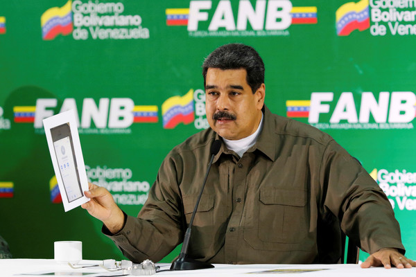 ▲▼為防止走私損害，委內瑞拉總統表示該國油價應提升到國際水平。（圖／路透）
