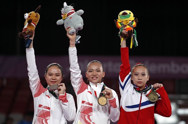 ▲雅加達亞運,北韓體操好手金淑珍（Kim Su Jong）奪個人全能賽銅牌。（圖／路透）