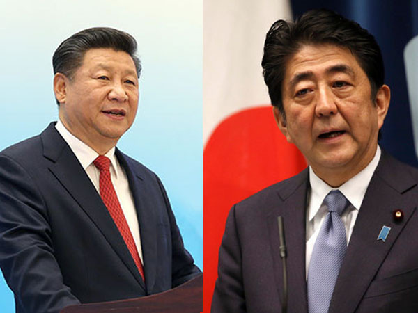 ▲日本首相安倍晉三（右）有望於10月訪問中國大陸會晤習近平（左）。（資料照／翻攝自新華網、美聯社）。