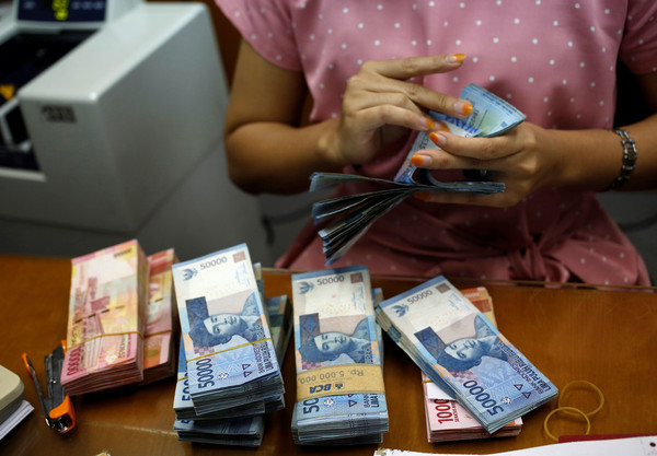 ▲印尼央行行長Perry Warjiyo先前也指出，雖然印尼盾是繼盧比後表現最差的新興市場貨幣，但仍是可控制的。。（圖／路透社）
