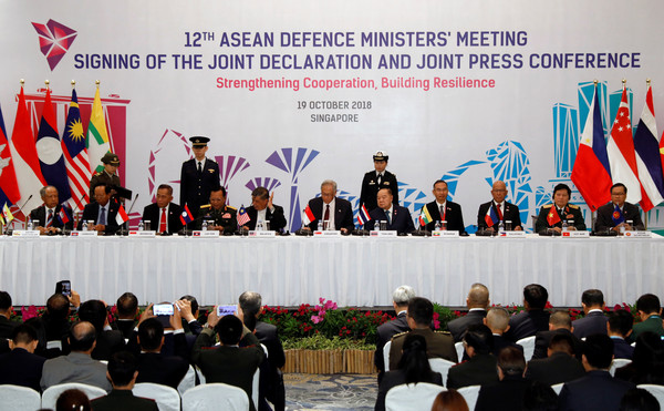 ▲▼東南亞國協其中10個成員國在新加坡簽署世界首個軍機空中遭遇多邊協議。（圖／路透）