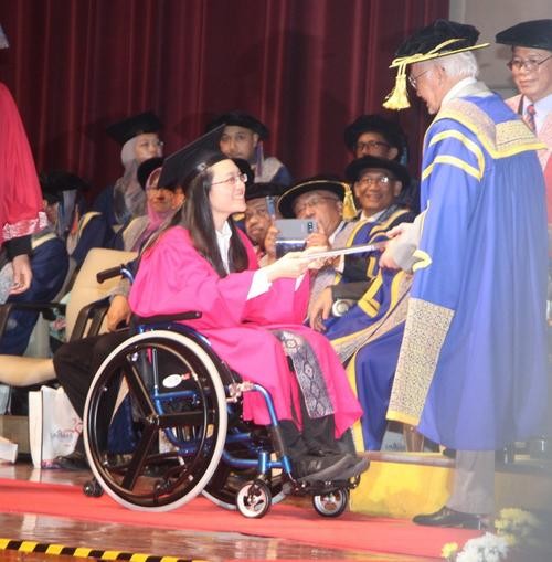 ▲▼ 馬來西亞華裔楊曉惠在輪椅上修完碩士。（圖／翻攝自中國—東盟博覽會網站）