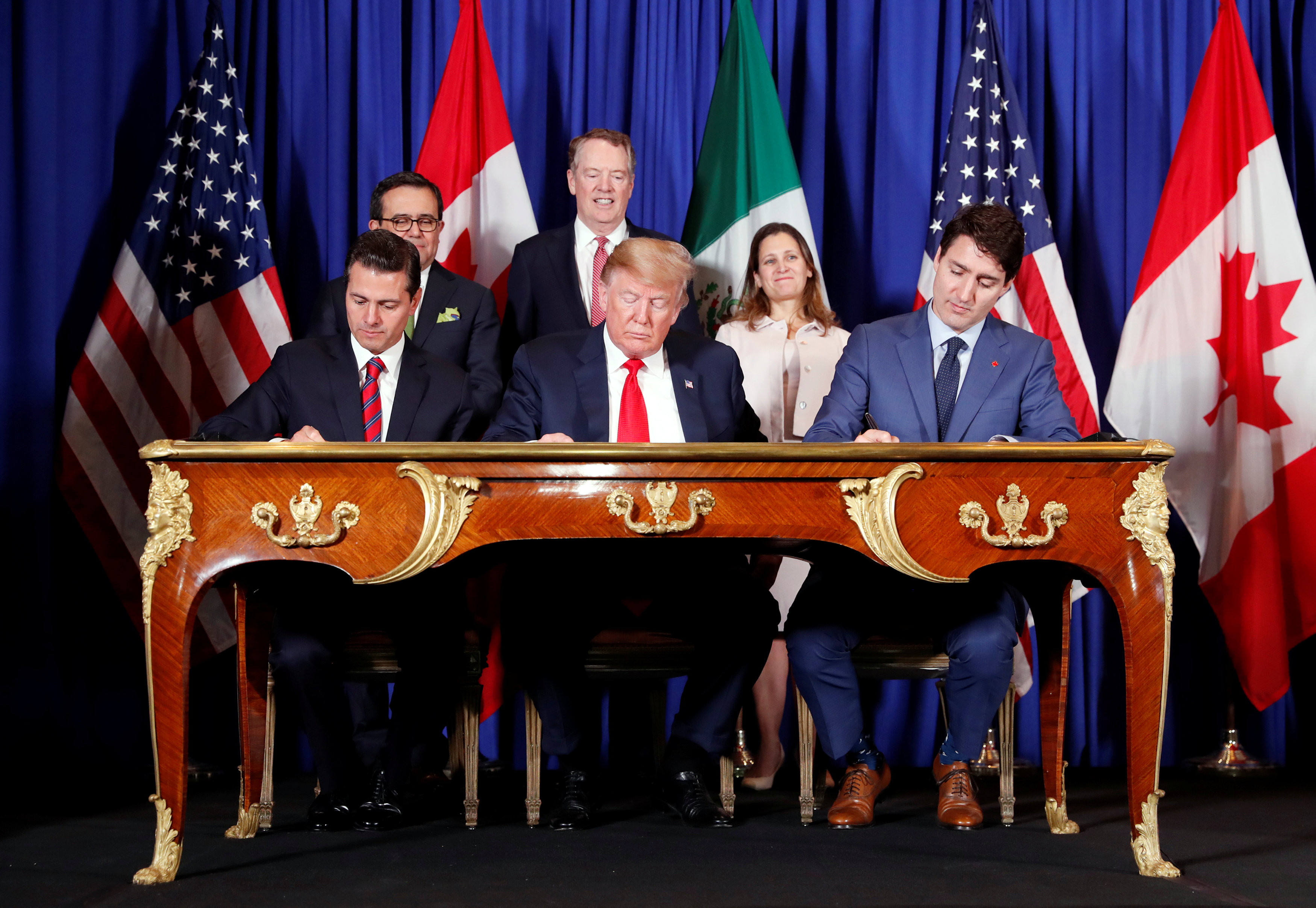 ▲美國總統川普（Donald Trump）在二十國集團（G20）簽署《美國－加拿大－墨西哥協定》（United States–Mexico–Canada Agreement, USMCA）。（圖／路透社）