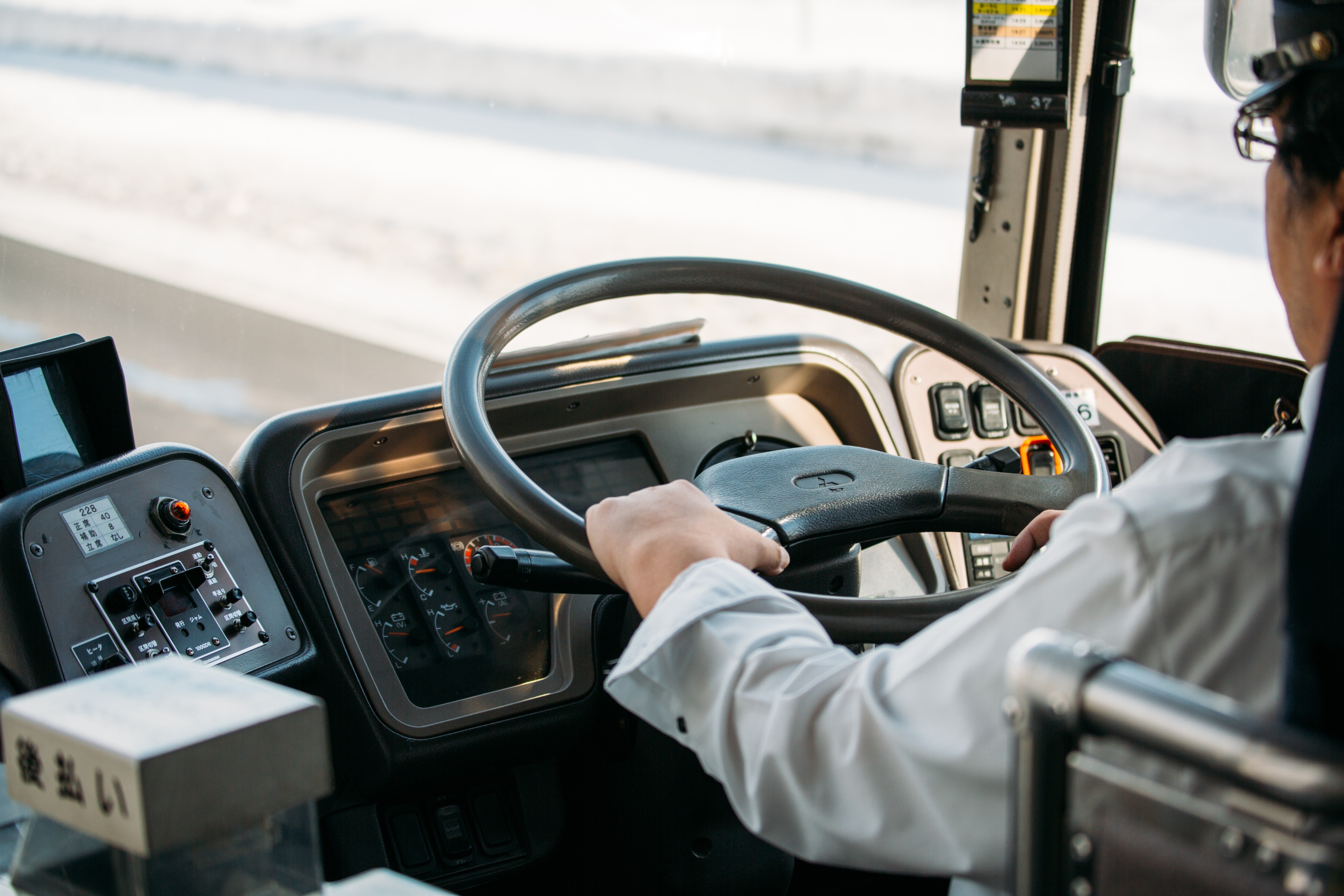 Bus driver. Bus Driver in Korea. Bus Driver helping man. Driver Bus Japan.