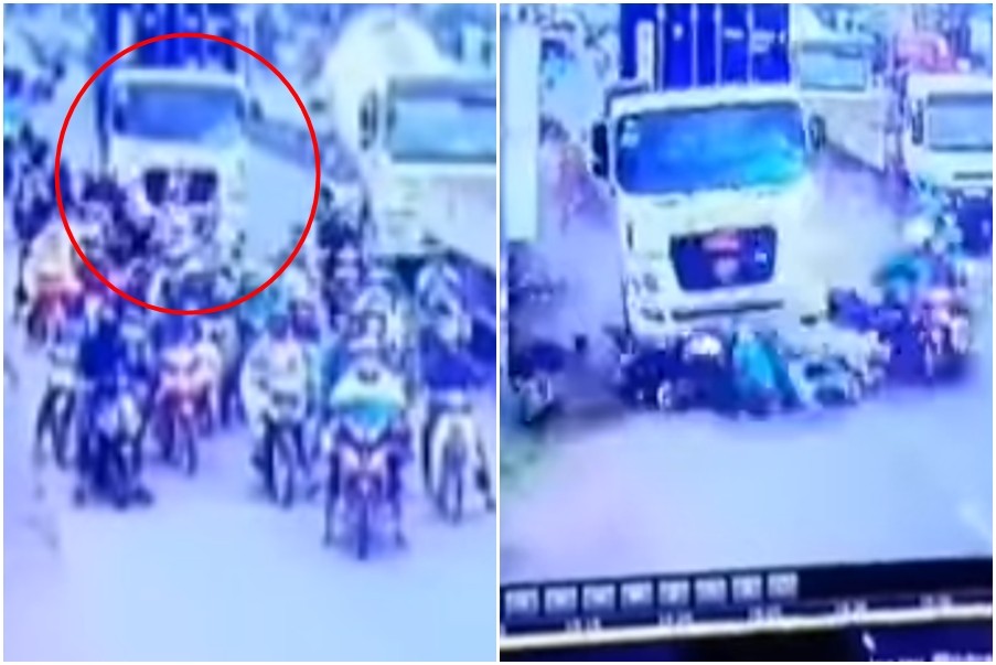 ▲越南隆安省一台貨櫃車失控，衝撞正在等紅燈的21輛機車。（圖／翻攝自YouTube）