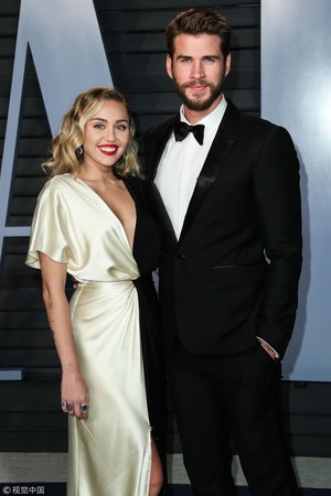 麥莉（Miley Cyrus）和連恩漢斯沃（Liam Hemsworth）。（圖／CFP）