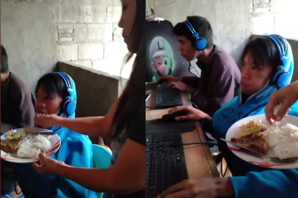 ▲▼菲律賓少年沉迷於電玩，媽媽親自餵食。（圖／翻攝自YouTube／Viral Press）