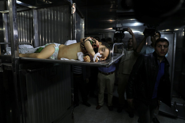 ▲▼加薩走廊遭遇暴力衝突，14個月大的巴勒斯坦女嬰躺在加薩一家醫院的停屍間。（圖／路透）