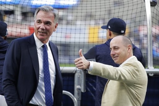 ▲運動家營運總裁比恩（Billy Beane）與洋基總管凱許曼（Brian Cashman）。（圖／達志影像／美聯社）