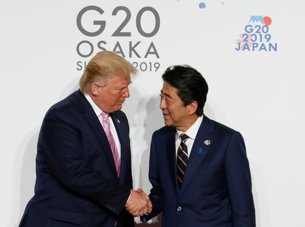 ▲川普到大阪參加G20，與安倍晉三會談。（圖／路透）