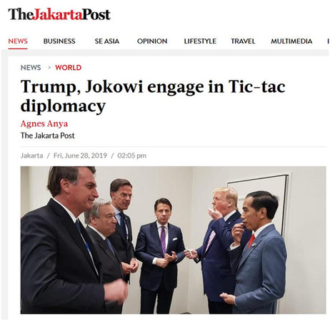 ▲川普在G20給多國領導人分糖吃。圖右為印尼總統科科威。（圖／佐科威推特)