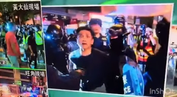 ▲香港迪士尼舞者於旺角被警方逮捕。（圖／翻攝自影片）