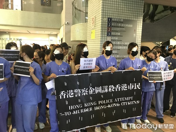 ▲香港東區醫院醫護人員集會。（圖／讀者授權提供，請勿隨意取用以免侵權）