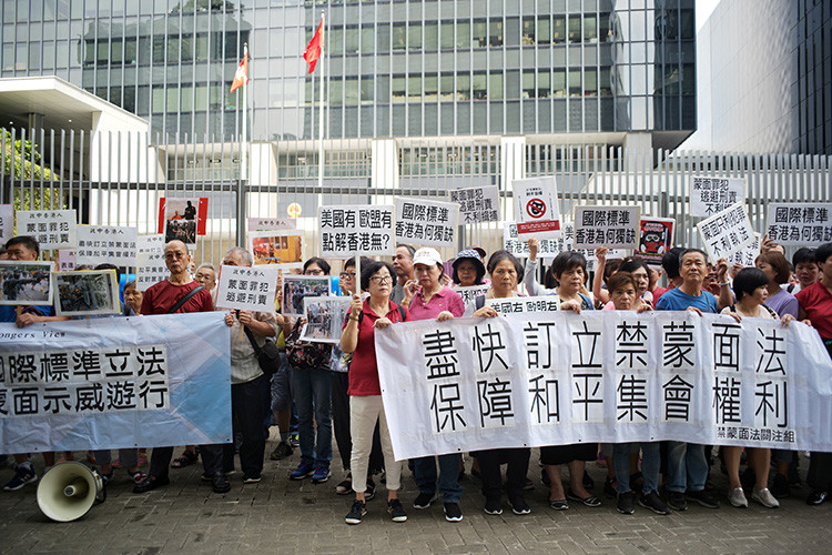 ▲香港民間團體要求港府禁止蒙面示威遊行。（圖／翻攝自《新京報》）