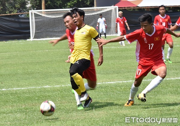 ▲▼ 亞大足球錦標賽，越南（紅）vs馬來西亞           。（圖／記者謝孟儒攝）