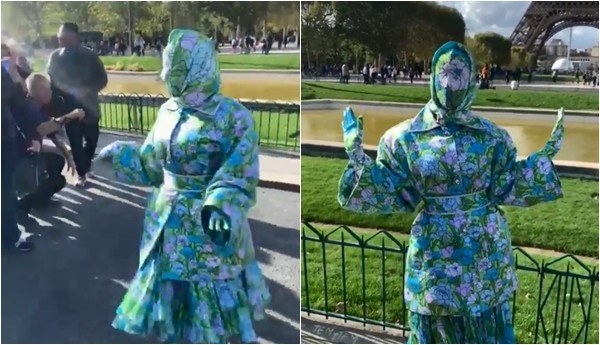 ▲巴黎街頭出現了一位全身用花布料套裝包緊緊的路人。（圖／翻攝卡蒂B IG）