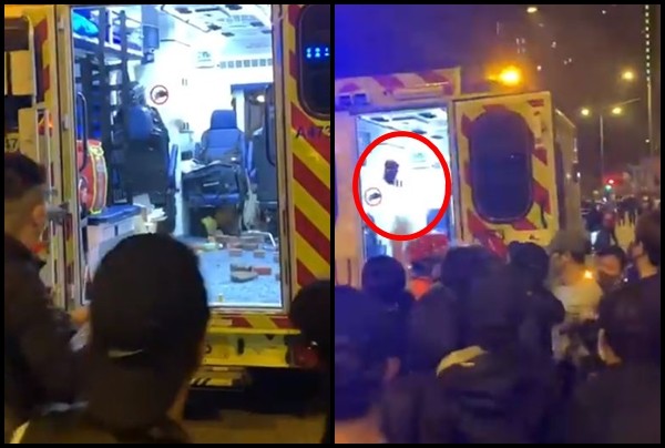 ▲▼示威者包圍救護車朝裡頭扔雜物。（圖／翻攝自香港警察臉書粉專）