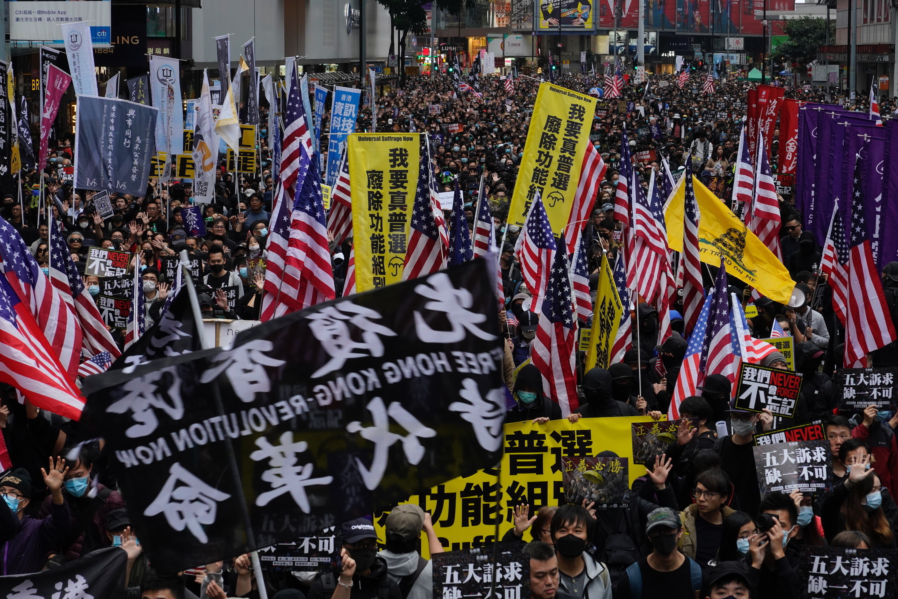 ▲▼香港1月1日「元旦大遊行」，港警稱拘捕約400人。（圖／達志影像／美聯社）