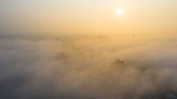 ▲▼  知名攝影師余信賢利用空拍機拍下嘉義市多處高樓被雲海圍繞美景。（圖／余信賢提供）