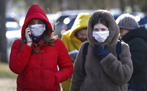 ▲▼疫情爆發後，紐西蘭街頭許多民眾也戴起口罩。（圖／達志影像／美聯社）