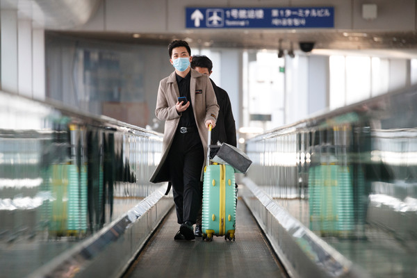 ▲自3月16日起，旅客入境北京機場後，需強制集中隔離         。（圖／路透）