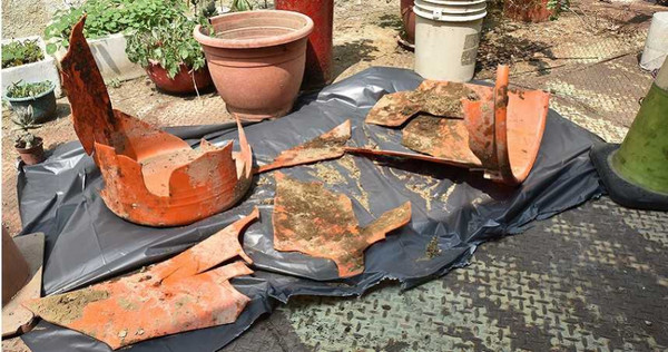 高雄發生駭人聽聞的高雄桶屍案，隔天岡山警方公布藏婦人遺體的橘色塑膠桶，以便民眾指認。（圖／報系資料照）