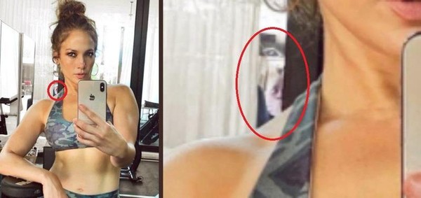 珍妮佛羅培茲在住家的健身房運動後自拍，但網友都把焦點放在她肩膀上方的男子臉孔，不斷猜那是誰。（翻攝自Jennifer Lopez官方推特）