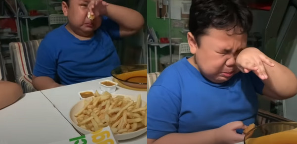 9歲男孩吃到朝思暮想的麥當勞直接痛哭流涕。（翻攝YouTube）