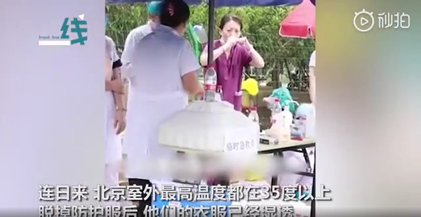 ▲▼北京檢疫，護士在酷熱天氣中暑。（圖／取自燃新聞）