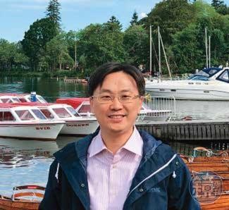 副教授王靖欣（圖）被控讓李泰山掛名論文第一作者，換取主管職位。（讀者提供）