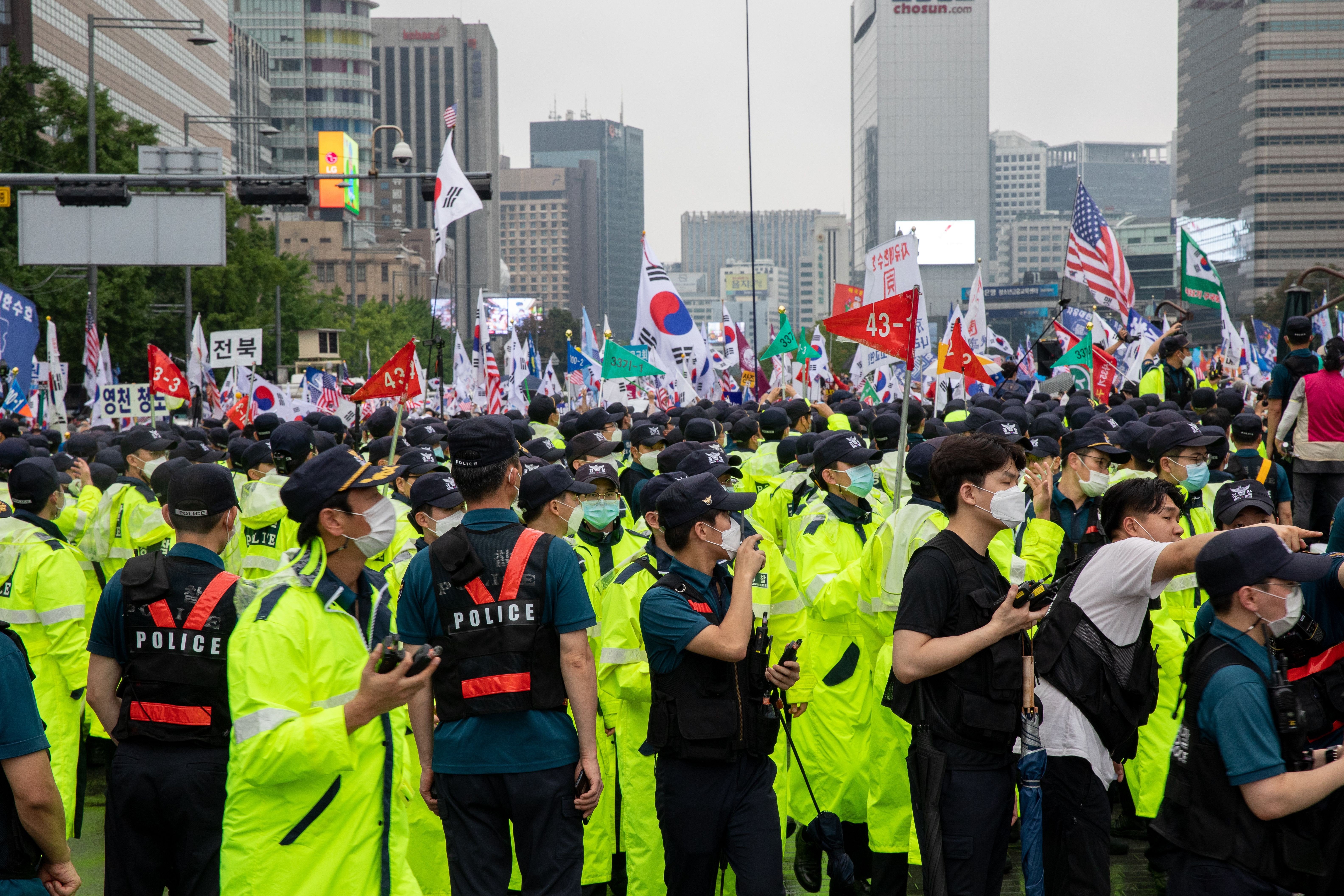 ▲▼南韓前國會議員車明進參與光化門示威，遭感染新冠肺炎。（圖／達志影像）