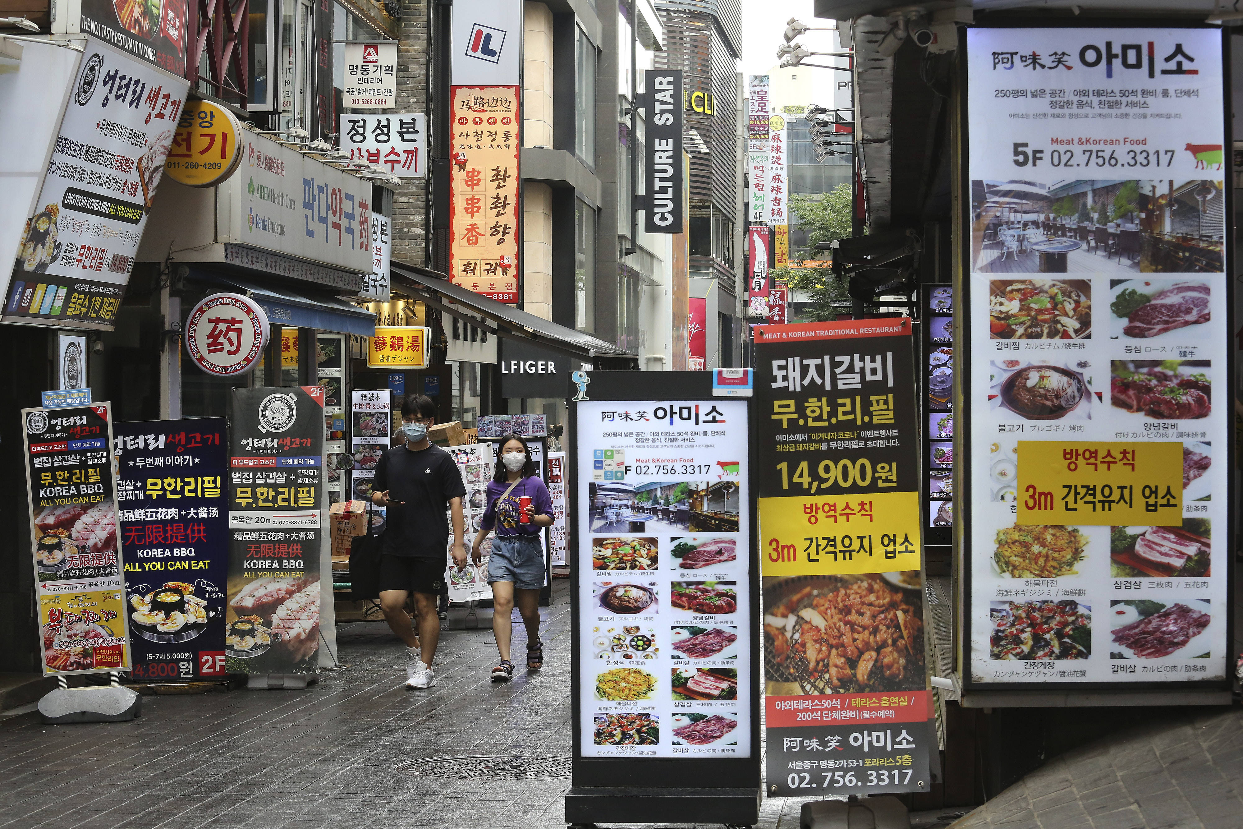 ▲▼南韓政府下達更強一波防疫政令，首爾街頭、餐飲店家空蕩。（圖／達志影像／美聯社）